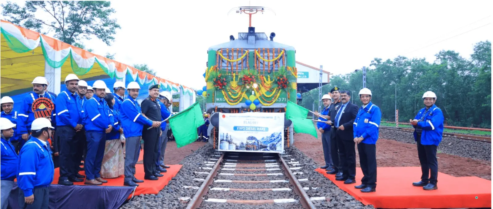 BPCL flag-off ceremony for new train service, showcasing officials and train in action.